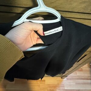 Brand new never worn open back sweater